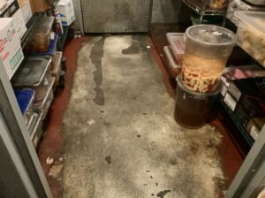 Delaminating epoxy floor in commercial kitchen