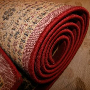 red rug rolled up